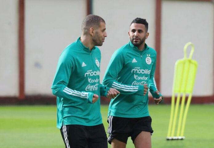 Pour apaiser la tension autour de leur non-convocation : Mahrez et Slimani invités pour assister au match Algérie-Guinée